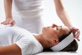 Woman at reiki session. Royalty Free Stock Photo